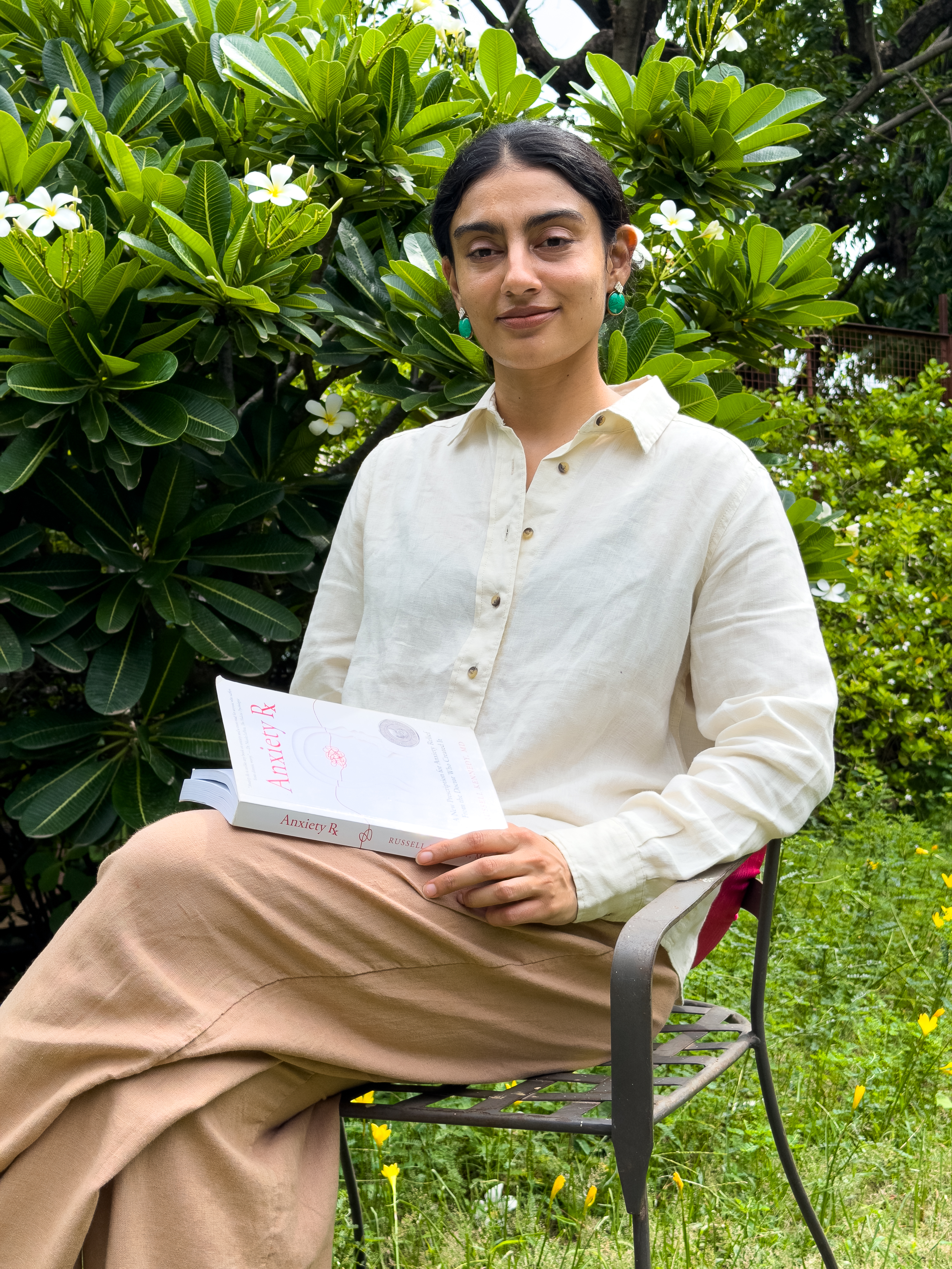 Warm therapy room chair — placeholder for Shambhavi Kumari portrait